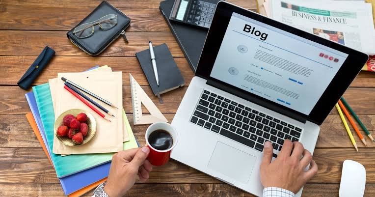 Professional content writer creating high-quality content on a laptop for SEO and digital marketing
